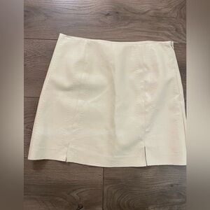 ALYA White/cream skirt with small slits in front. Worn once.